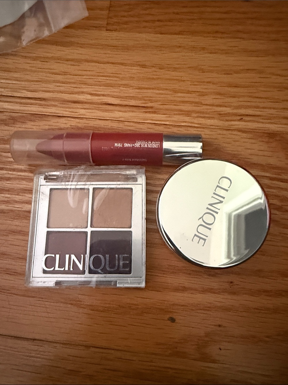 Clinique collection of three makeup items. New